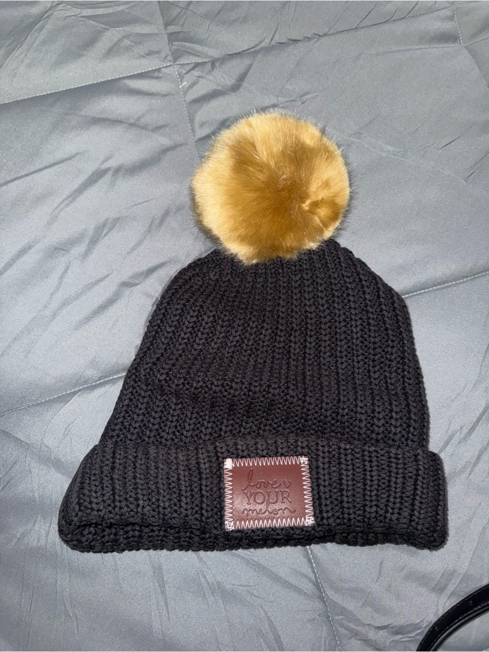 Love Your Melon Black Knit Beanie with Tan Faux Fur Pom
